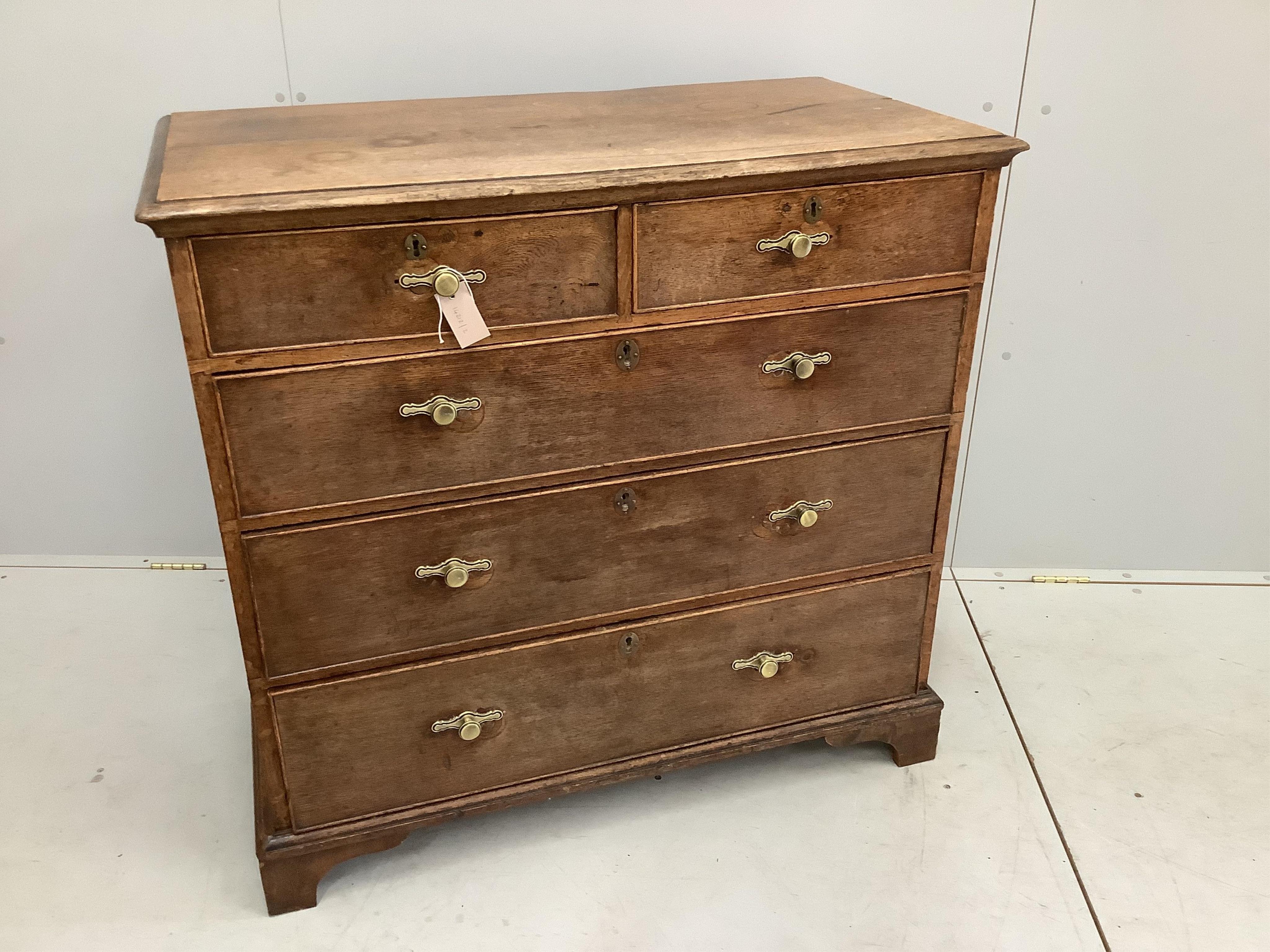A George III oak chest of drawers, width 100cm, depth 52cm, height 95cm